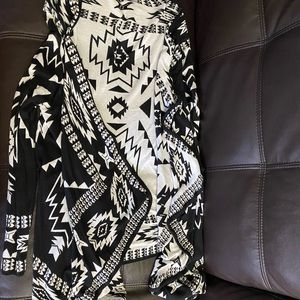 Two sided sweater style size medium black & white